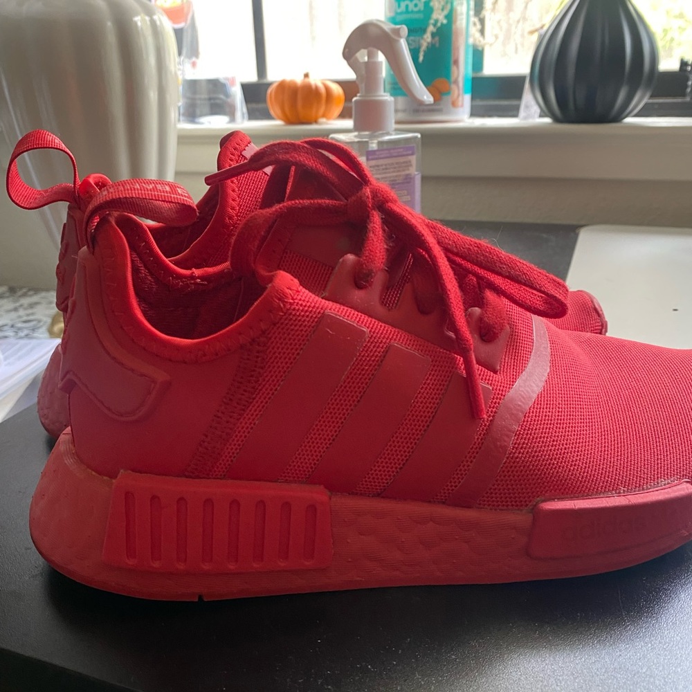 All red ADIDAS NMDS